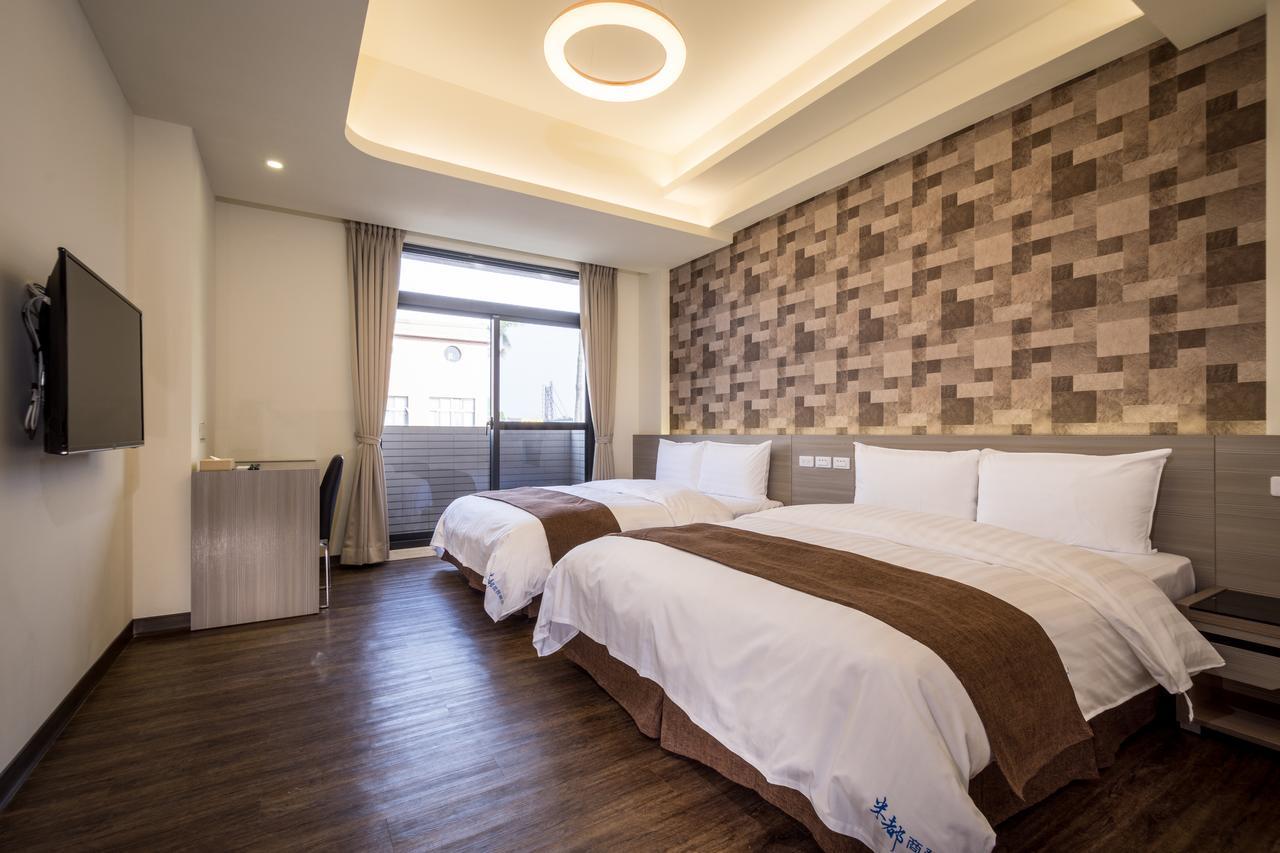 Midu Business Hotel Xiluo Екстериор снимка