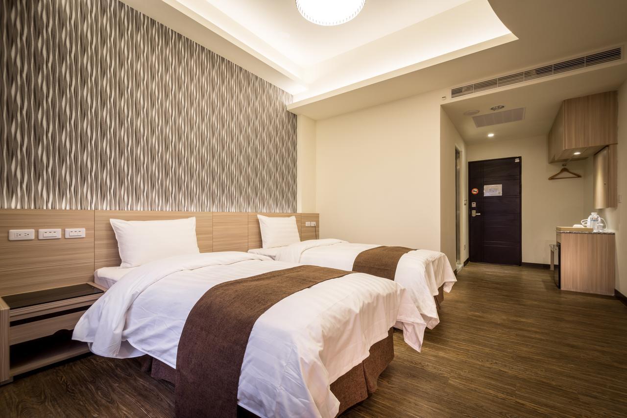 Midu Business Hotel Xiluo Екстериор снимка