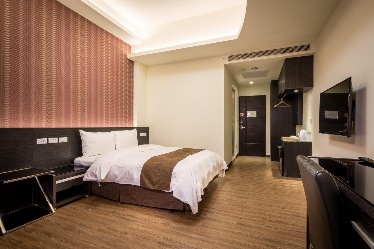 Midu Business Hotel Xiluo Екстериор снимка