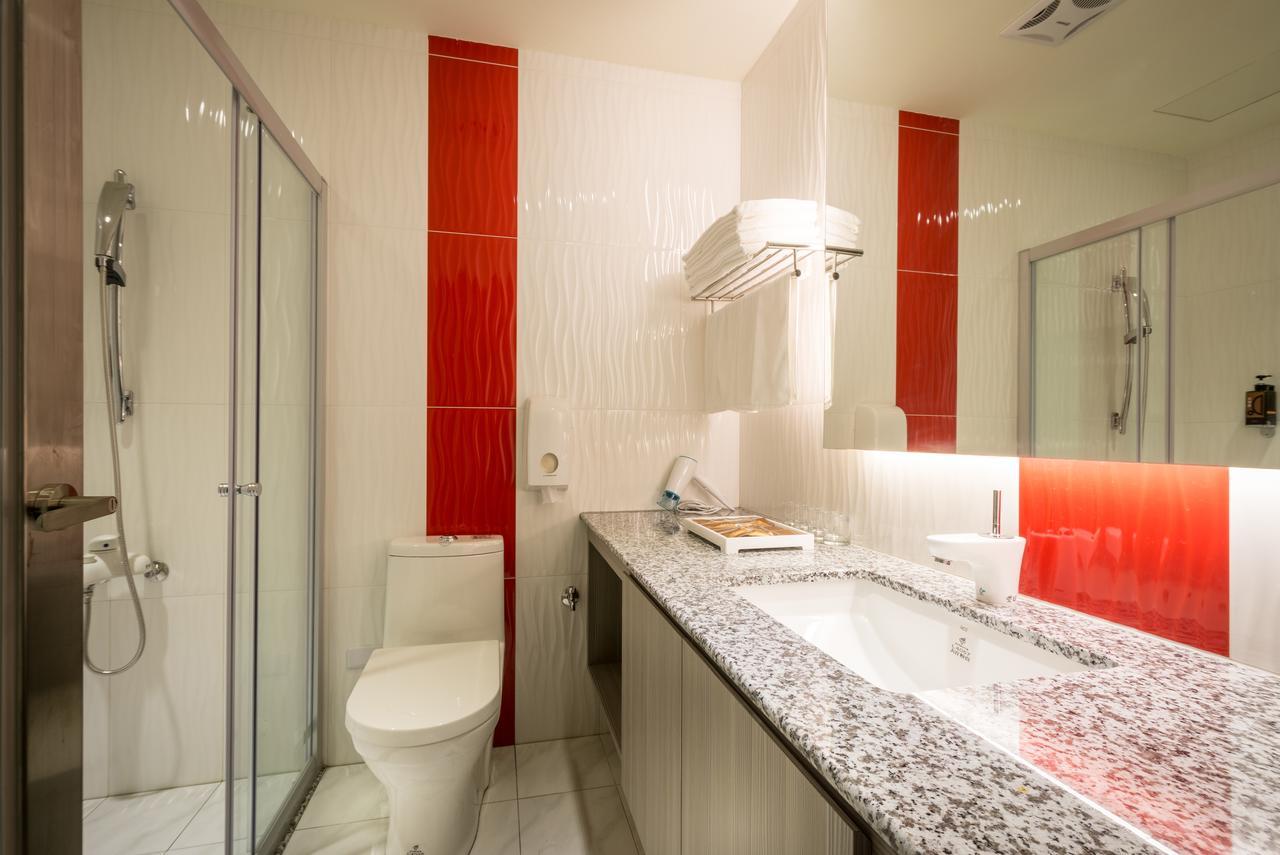Midu Business Hotel Xiluo Екстериор снимка