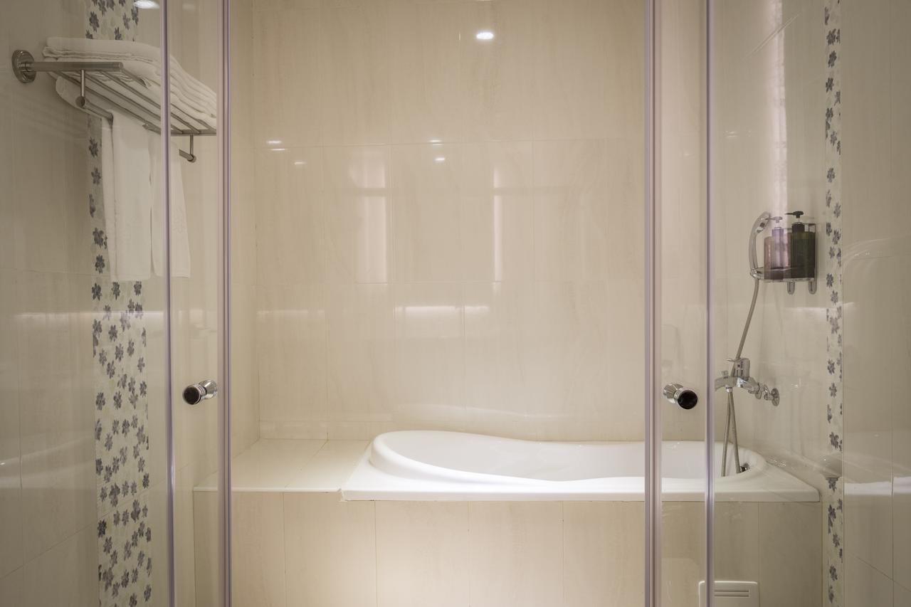 Midu Business Hotel Xiluo Екстериор снимка