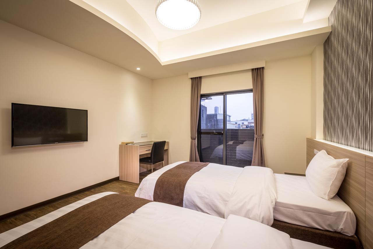 Midu Business Hotel Xiluo Екстериор снимка